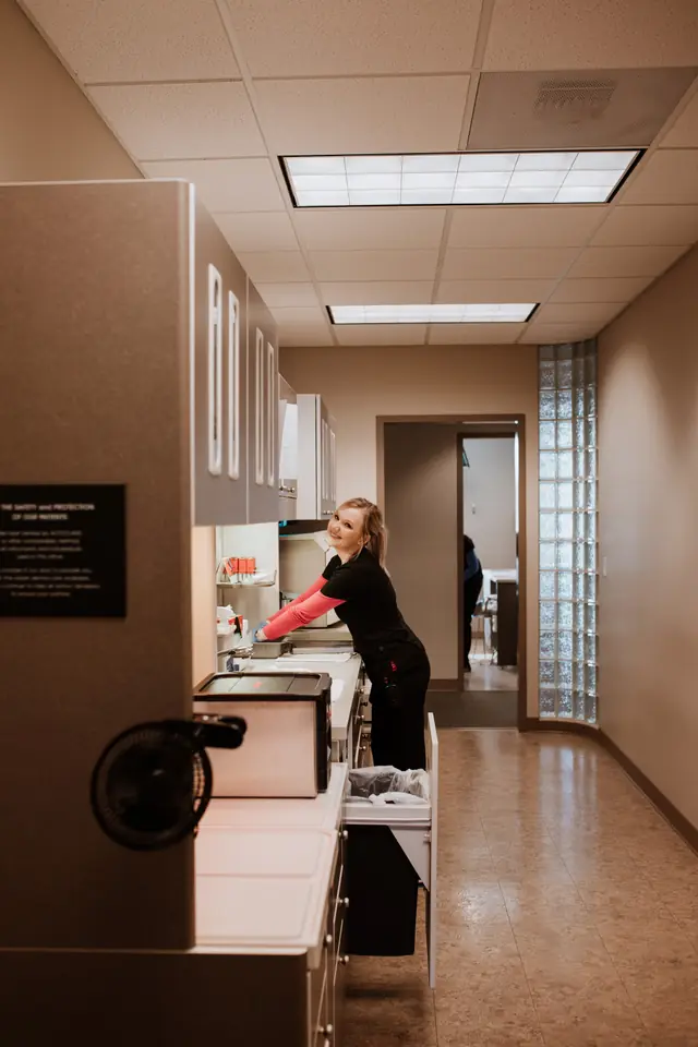 A Defiance Dental Group staff member at the practice's sterilization station
